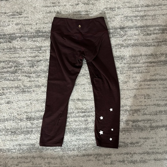 Spiritual Gangster Maroon cropped leggings with star details on one leg - Picture 2 of 3